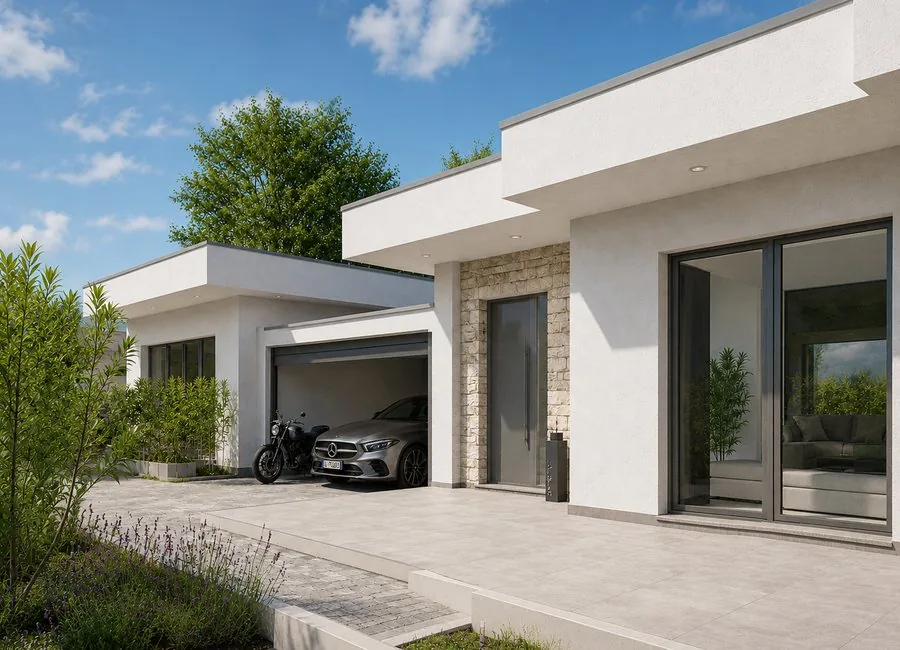 Vista diurna dell’ingresso della villa con box e cortile privato